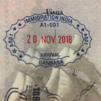 Photo of re-entry stamp into India at Banbasa, India, from our visa run
